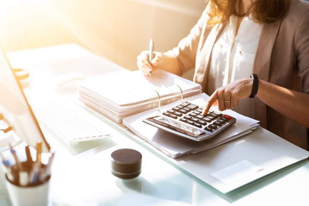 Accountant Calculating Budget And Tax. Corporate Finance